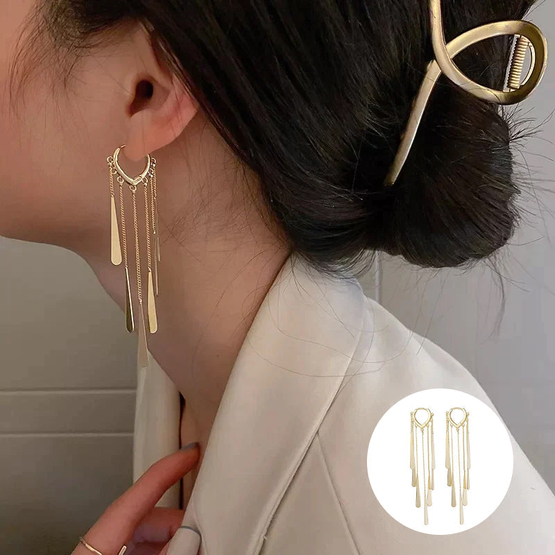 Boucles d'oreilles à long pompon à la mode