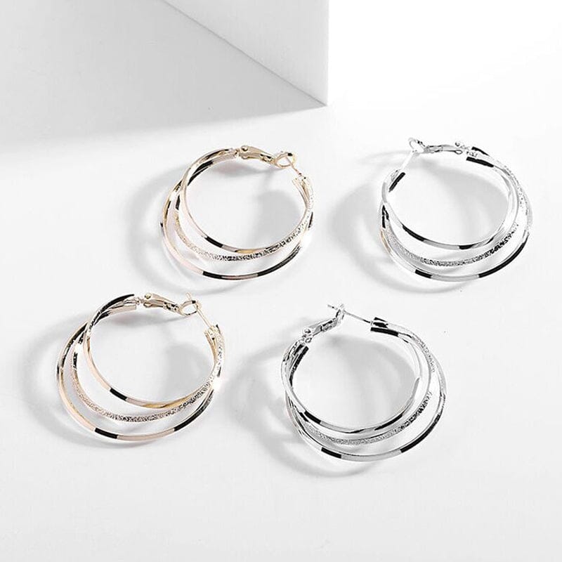 Boucles d'oreilles créoles triple anneau