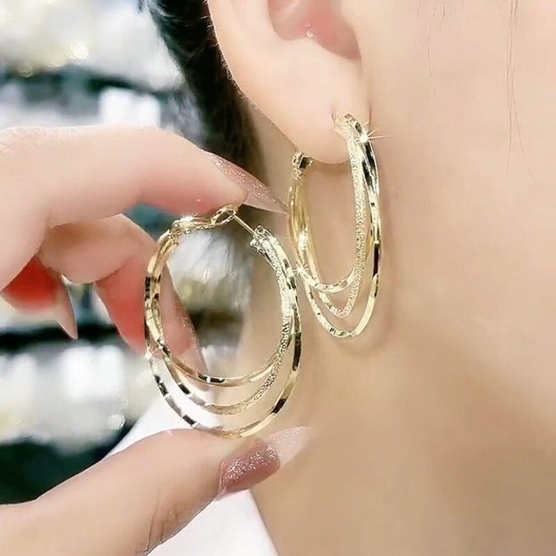 Boucles d'oreilles créoles triple anneau