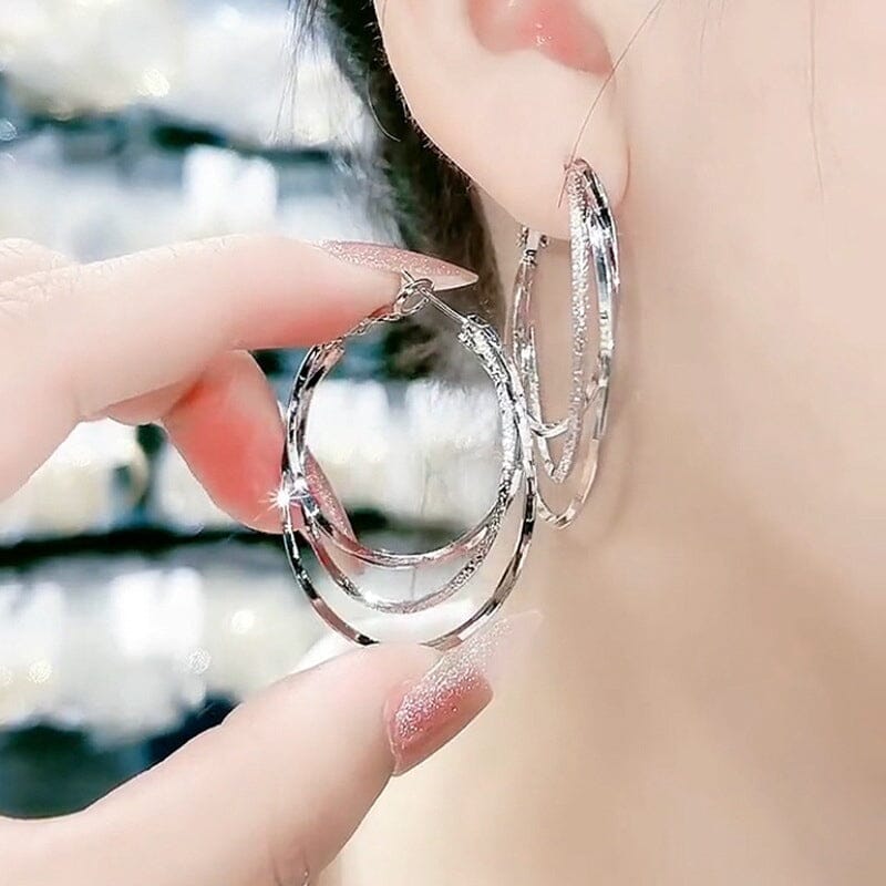 Boucles d'oreilles créoles triple anneau