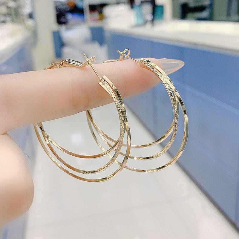 Boucles d'oreilles créoles triple anneau