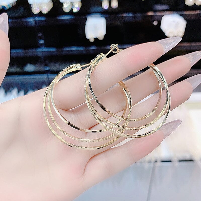 Boucles d'oreilles créoles triple anneau