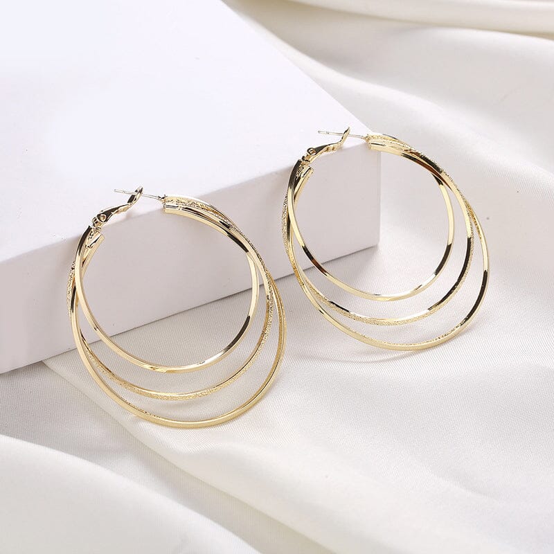 Boucles d'oreilles créoles triple anneau