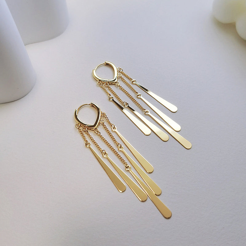 Boucles d'oreilles à long pompon à la mode